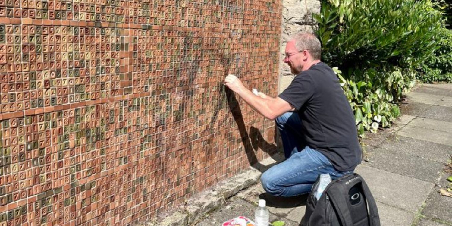 Carefully cleaning up the memorial 